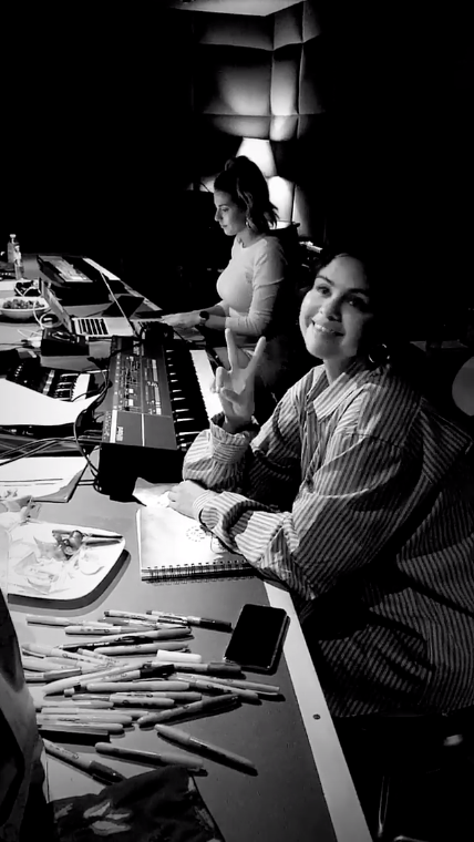 Selena Gomez looks happy in the studio working on her new album