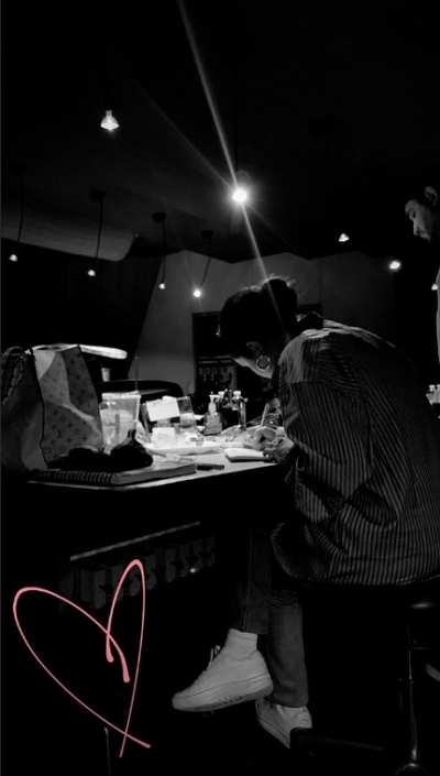 Selena Gomez writing music in the studio