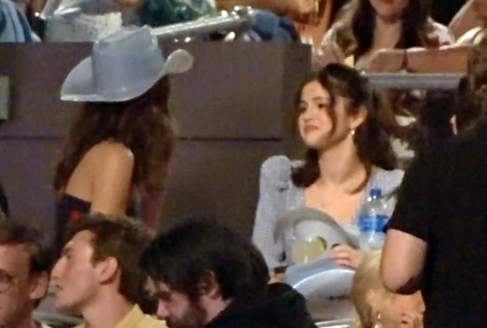 Selena Gomez smiling at a Kacey Musgraves concert