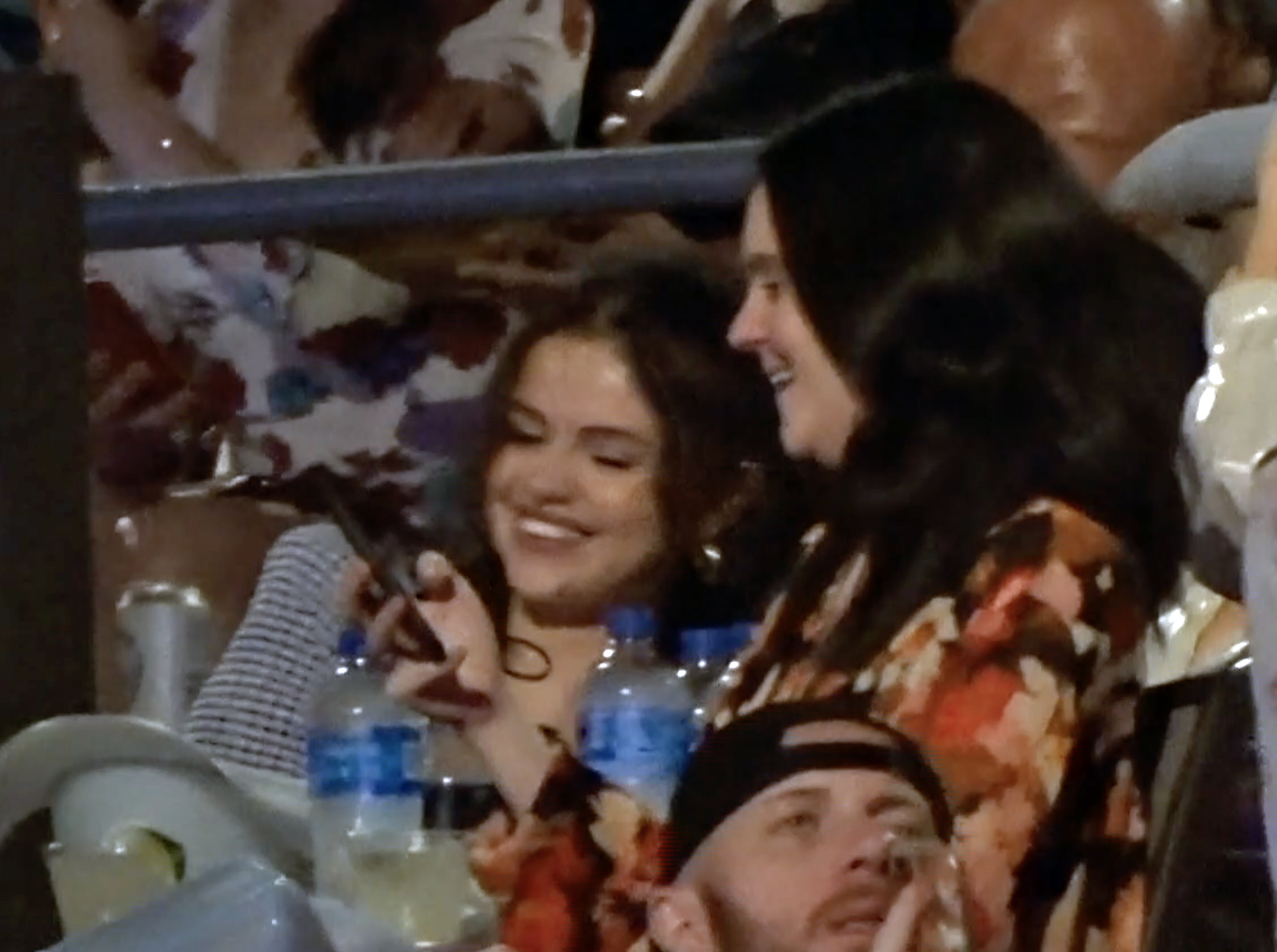Selena Gomez smiling at a Kacey Musgraves concert