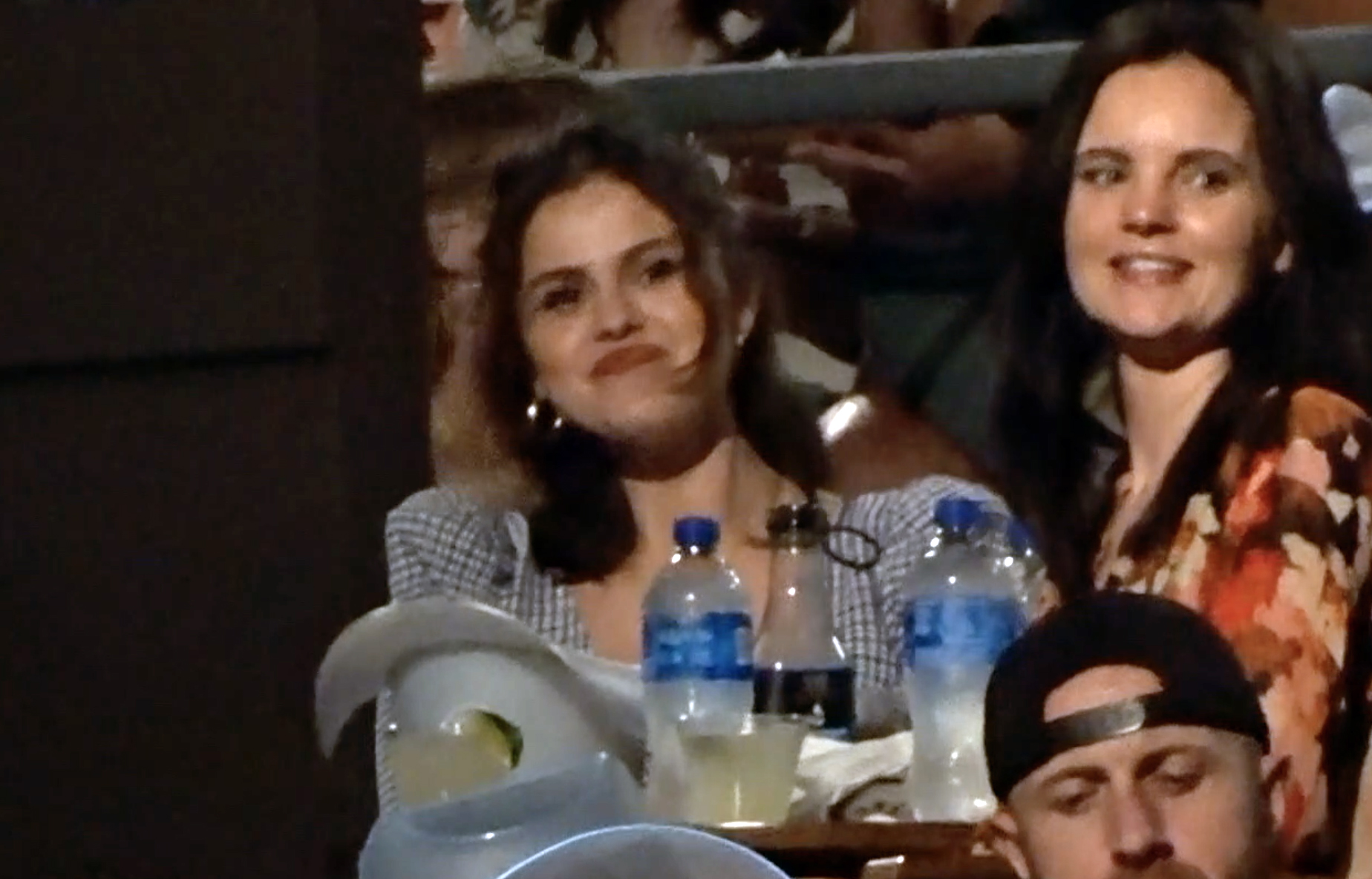 Selena Gomez smiling at a Kacey Musgraves concert