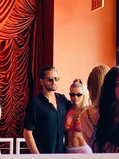 Scott Disick and Sofia Richie posing for a photo at her birthday party in Las Vegas.