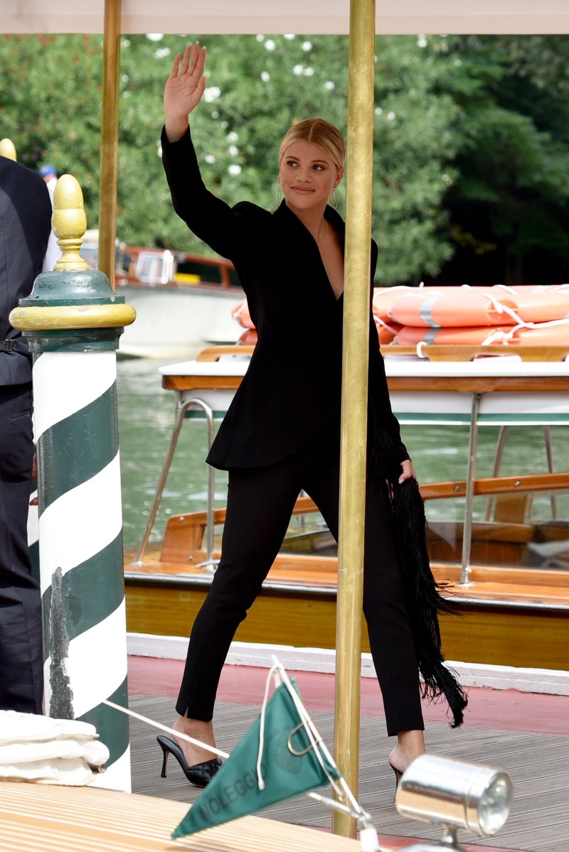 Sofia Richie wearing a black pantsuit at the Venice Film Festival