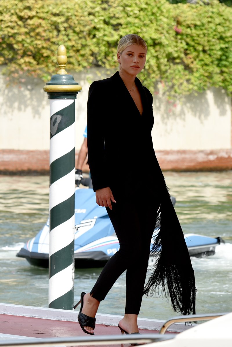 Sofia Richie wearing a black pantsuit at the Venice Film Festival