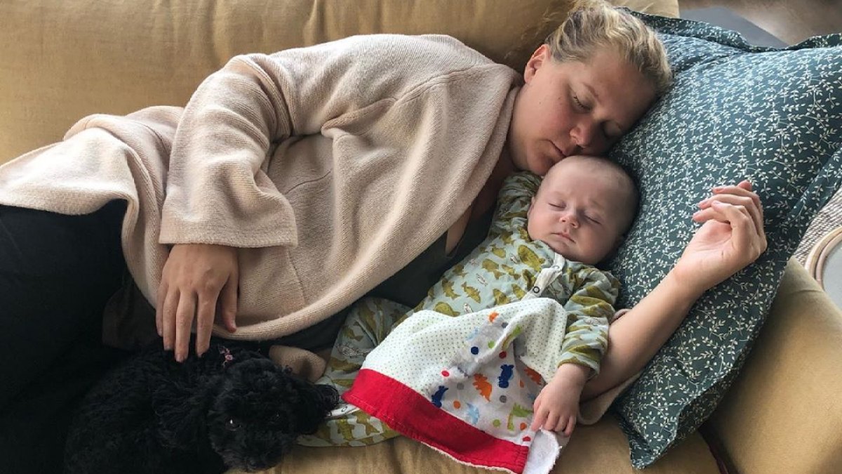 Amy Schumer and Gene Sleep on Couch
