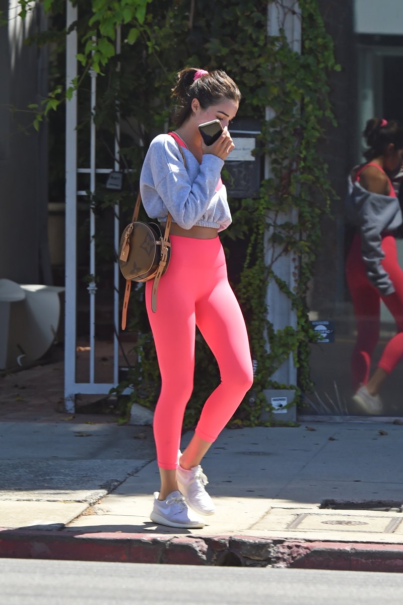 Olivia Culpo in a Crop Top and Hot Pink Leggings