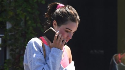 Olivia Culpo in a Crop Top and Hot Pink Leggings