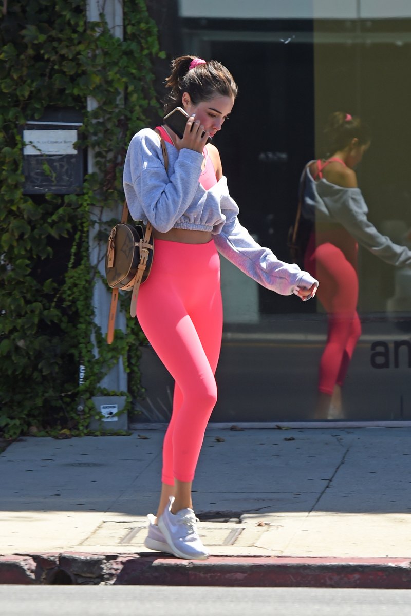 Olivia Culpo in a Crop Top and Hot Pink Leggings