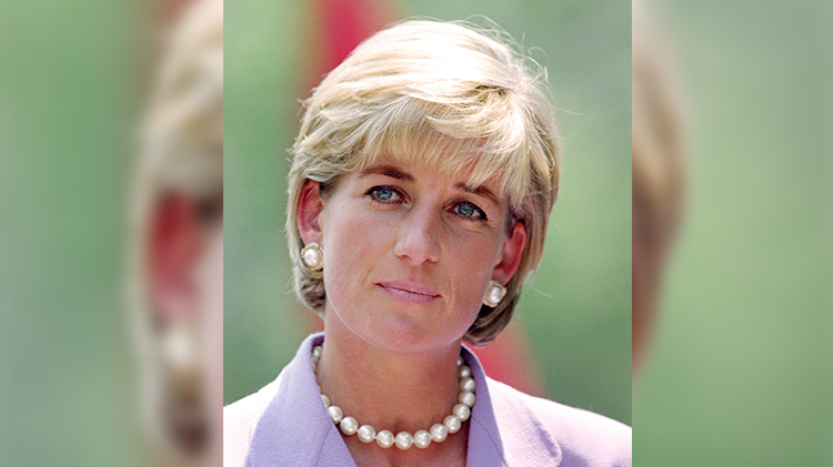 princess diana wears a lavendar blazer and pearls in vintage photo from 1997