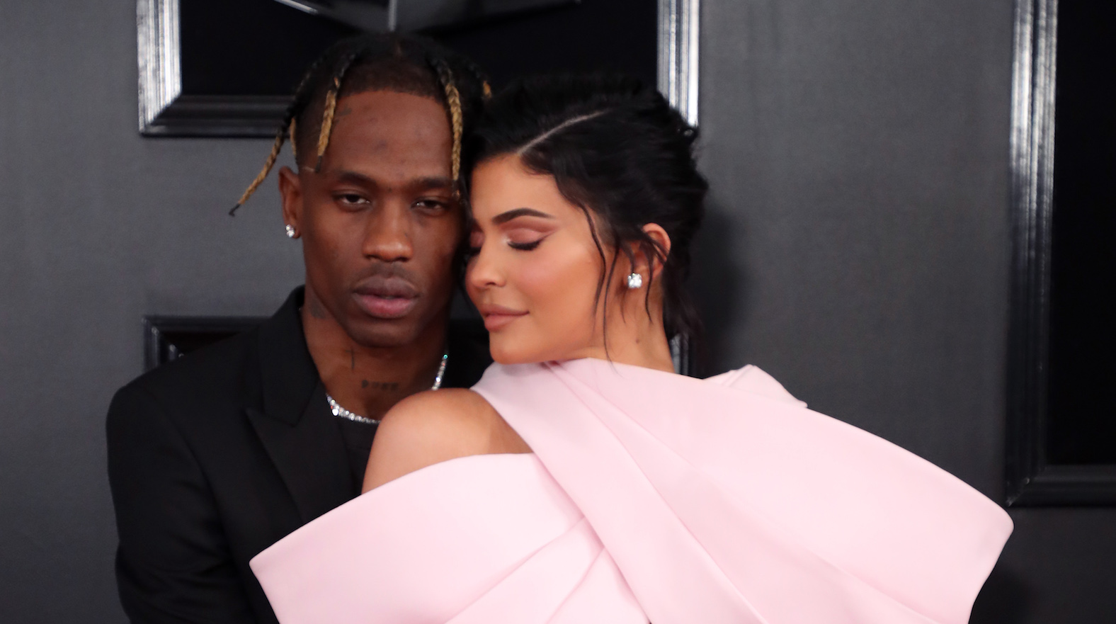 Kylie Jenner & Travis Scott Sit Front Row at the Louis Vuitton