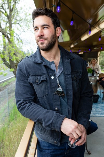 Derek Peth Smiles in Jean Jacket
