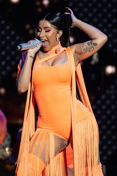 Cardi B Orange Costume on Stage Performance