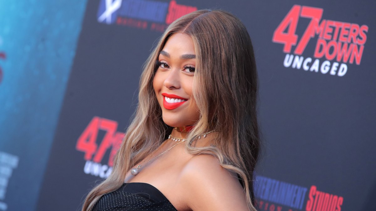 Jordyn Woods Close Up on 47 Meters Down Red Carpet Red Lipstick and Black Dress