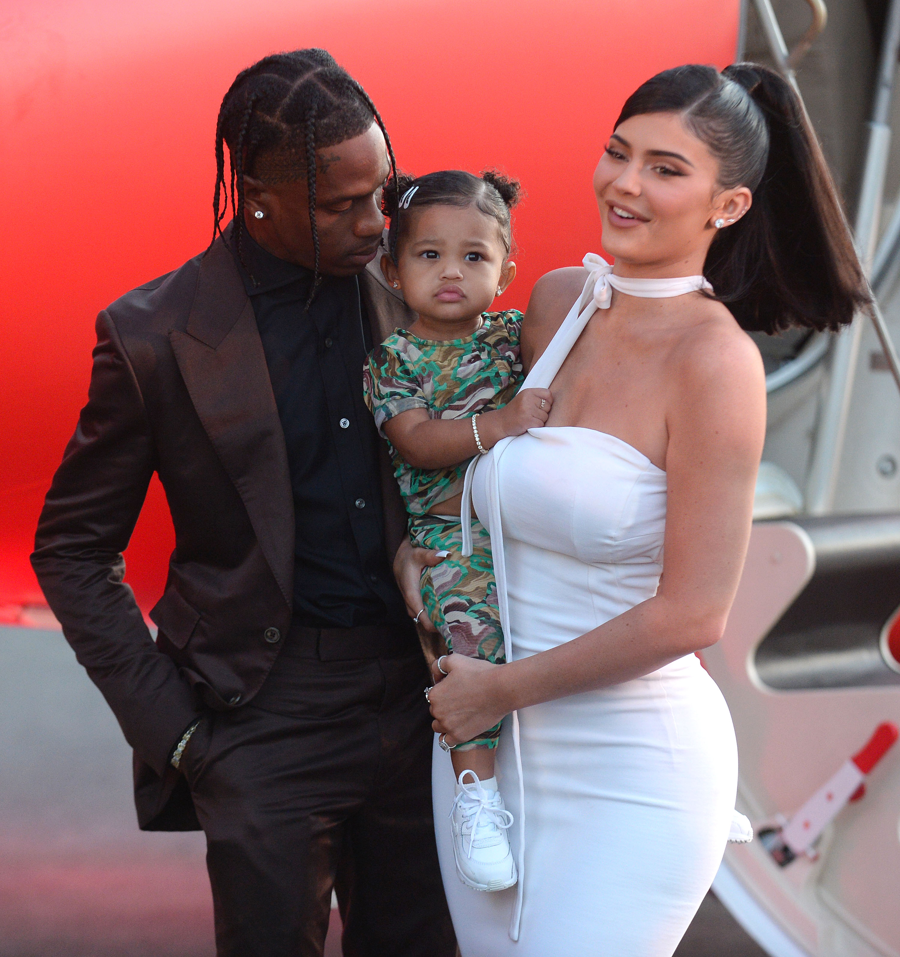 Kylie Jenner Laughs Holding Stormi Webster With Travis Scott