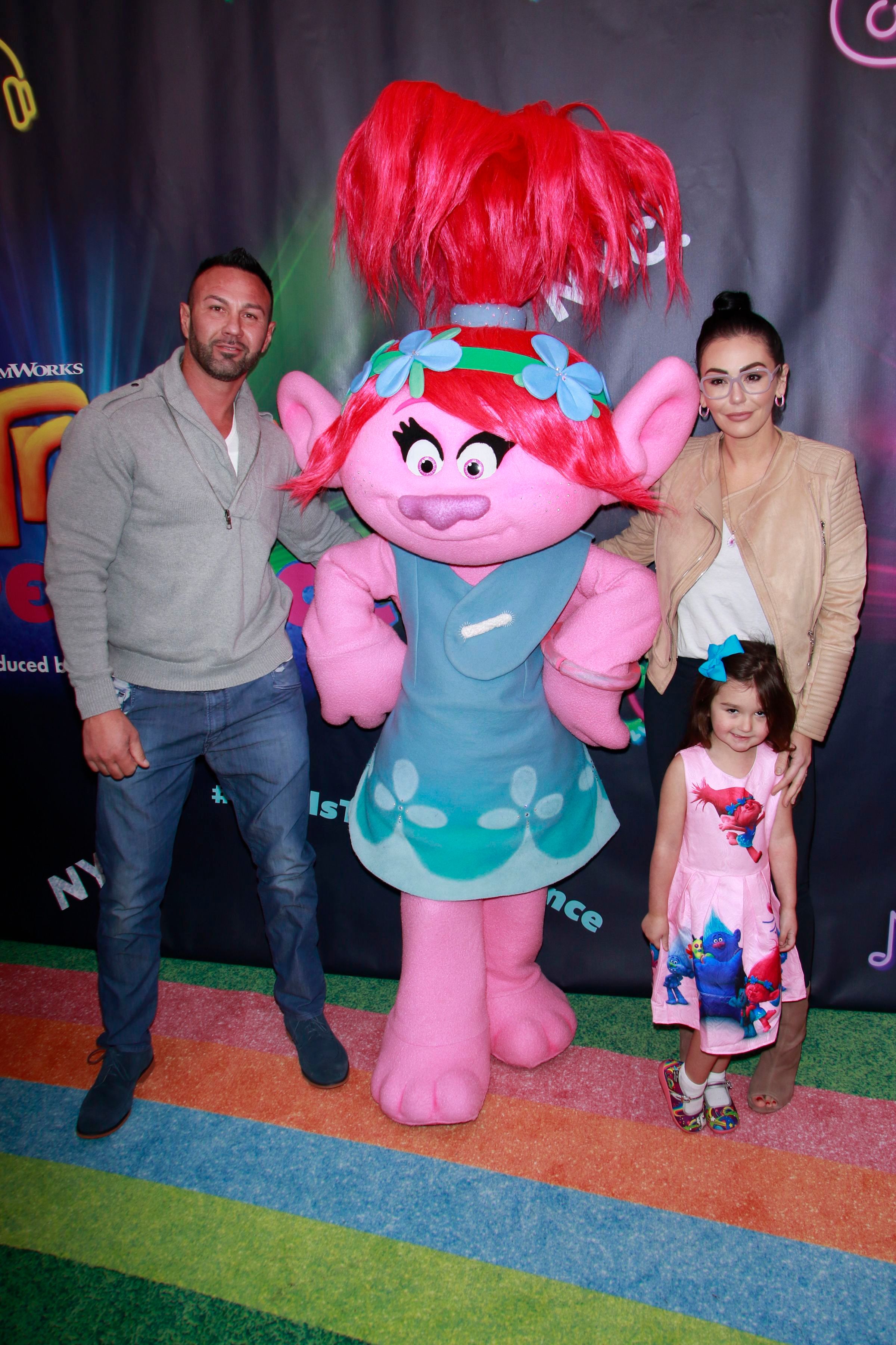 Jenni "JWoww" Farley posing with now-ex-husband Roger Mathews