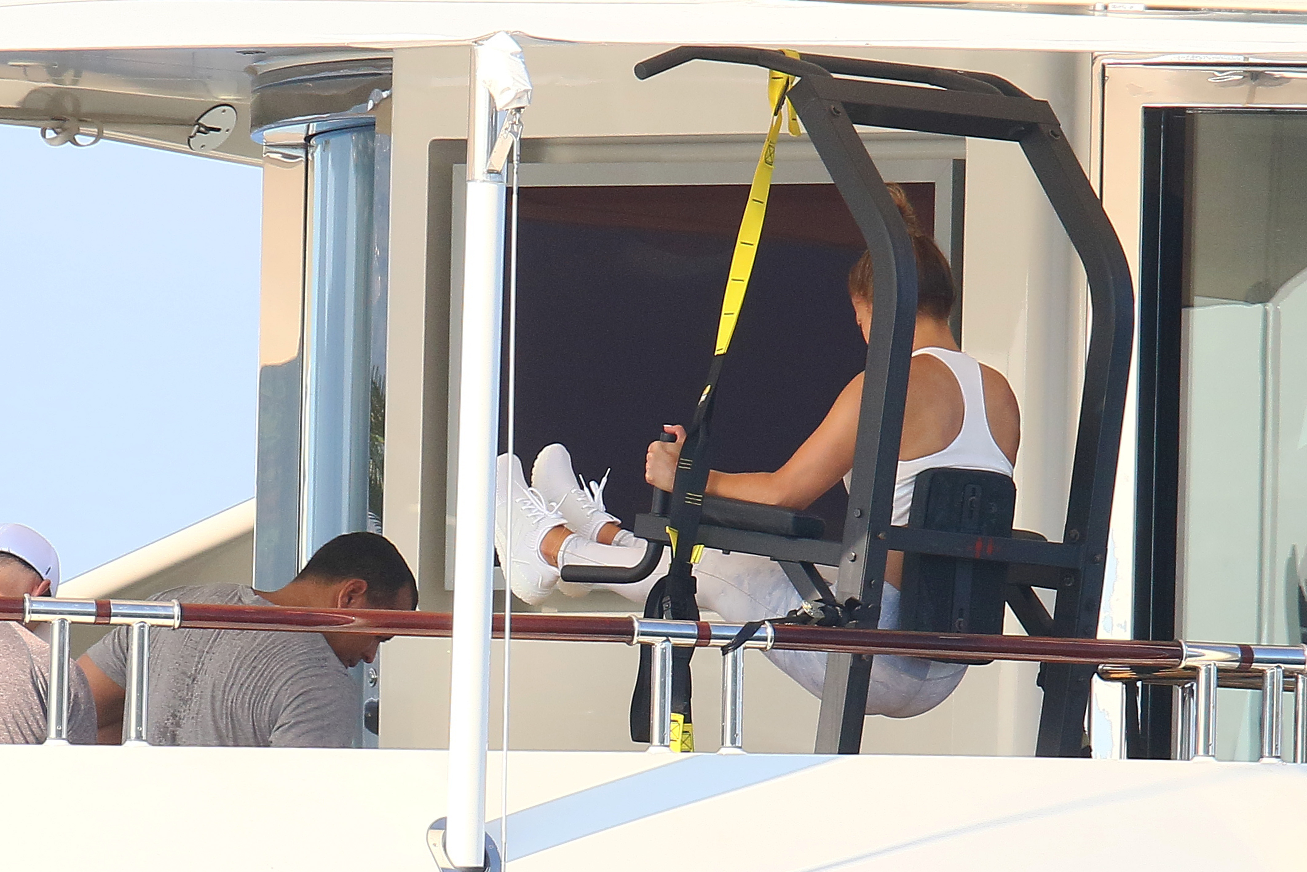 Jennifer Lopez works out while onboard a luxury yacht in the South of France