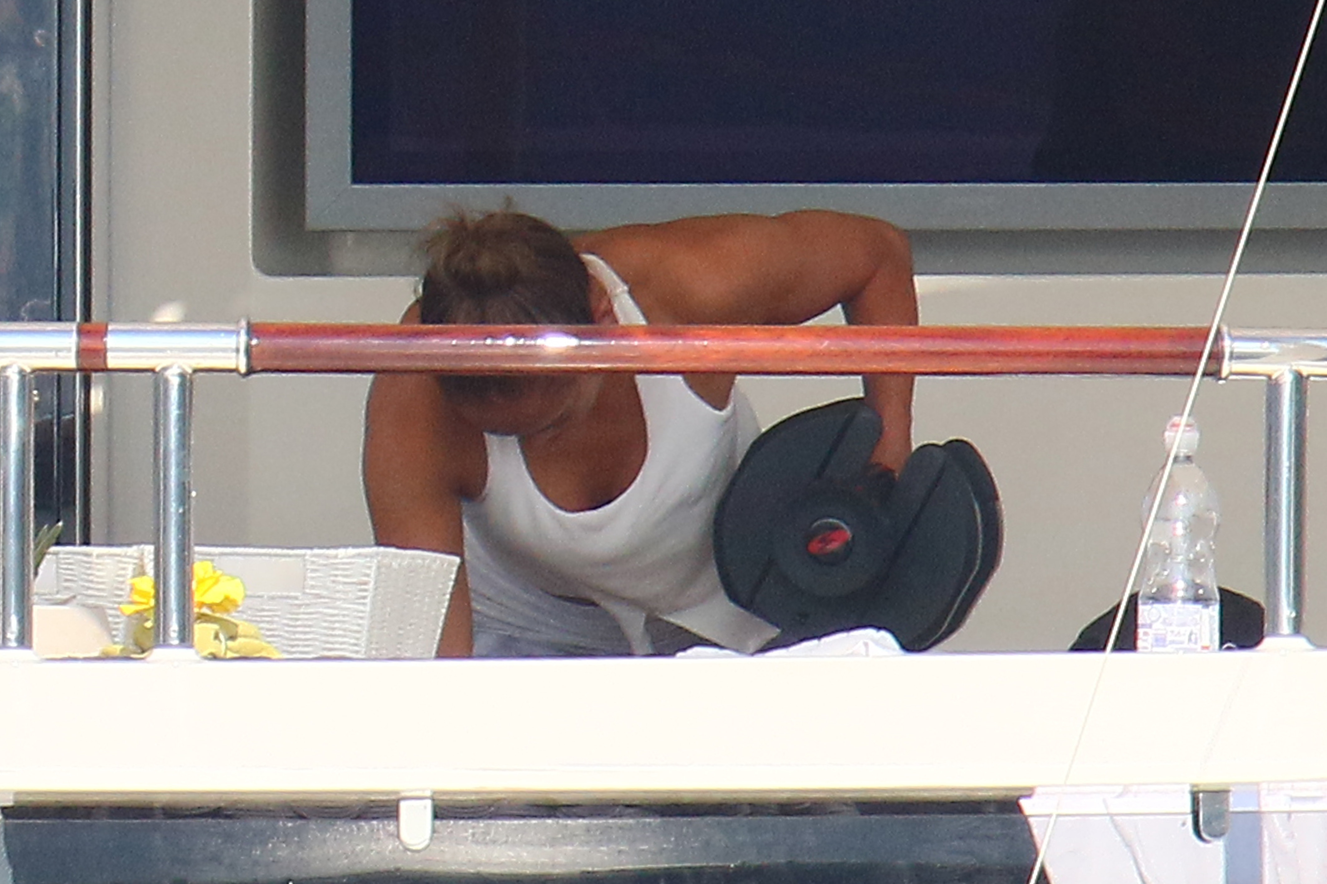 Jennifer Lopez works out while onboard a luxury yacht in the South of France