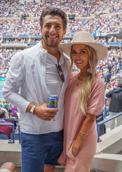 Kaitlyn Bristowe Wearing a Pink Dress With a Hat With Jason Tartick in a White Shirt With Jeans