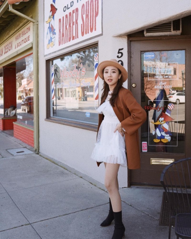 Lancy Zhang Wears White dress