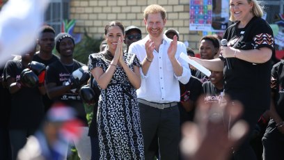 Duke and Duchess of Sussex tour of Africa Clapping and Smiling Meghan Markle and Prince Harry