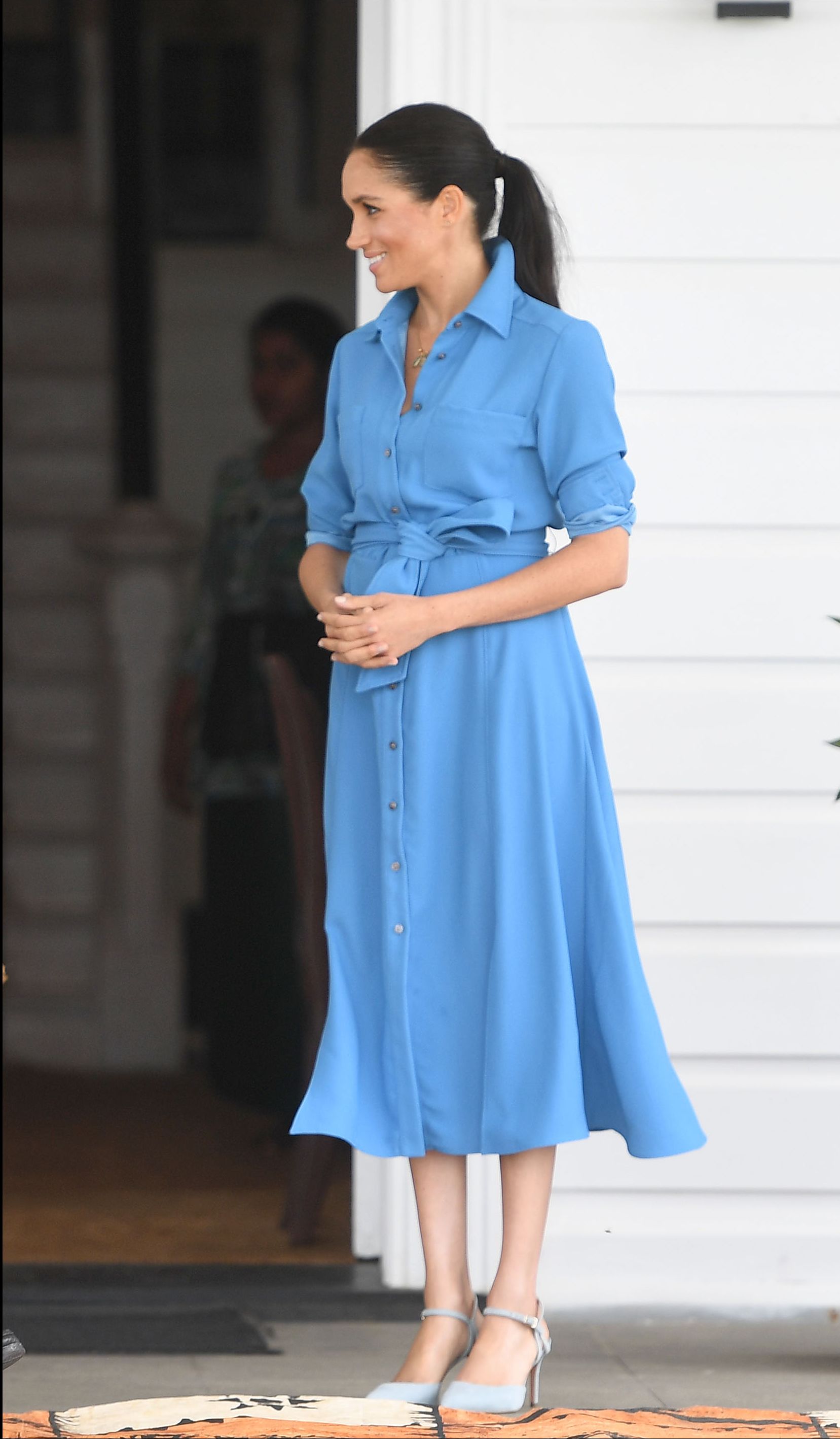 Meghan Markle wearing a blue dress in 2018