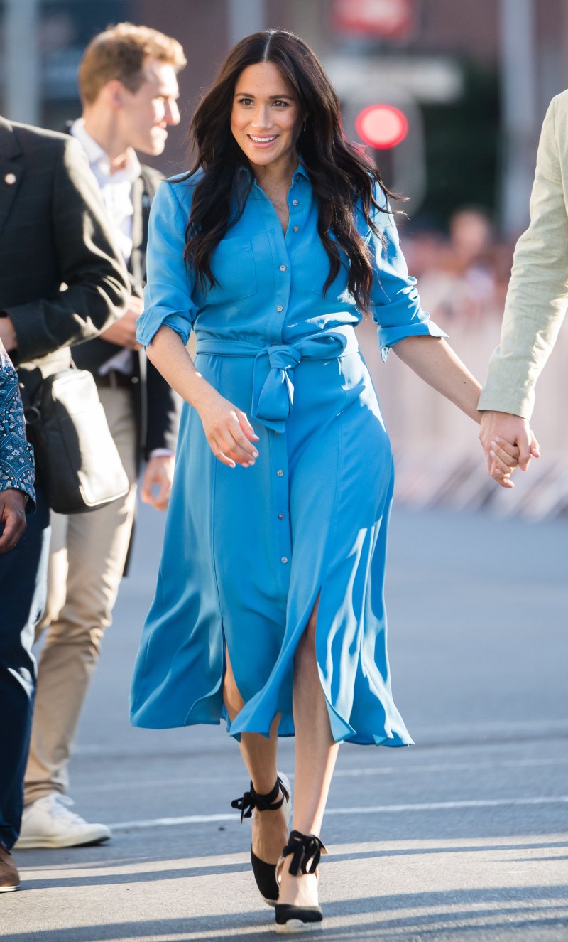 Meghan Markle wearing a blue dress in 2019