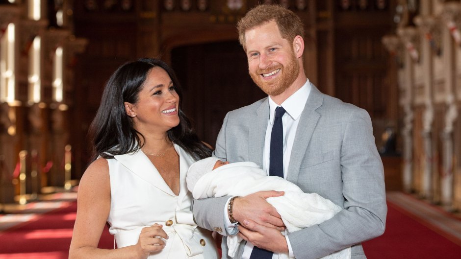Meghan Markle and Prince Harry holding their son, Archie