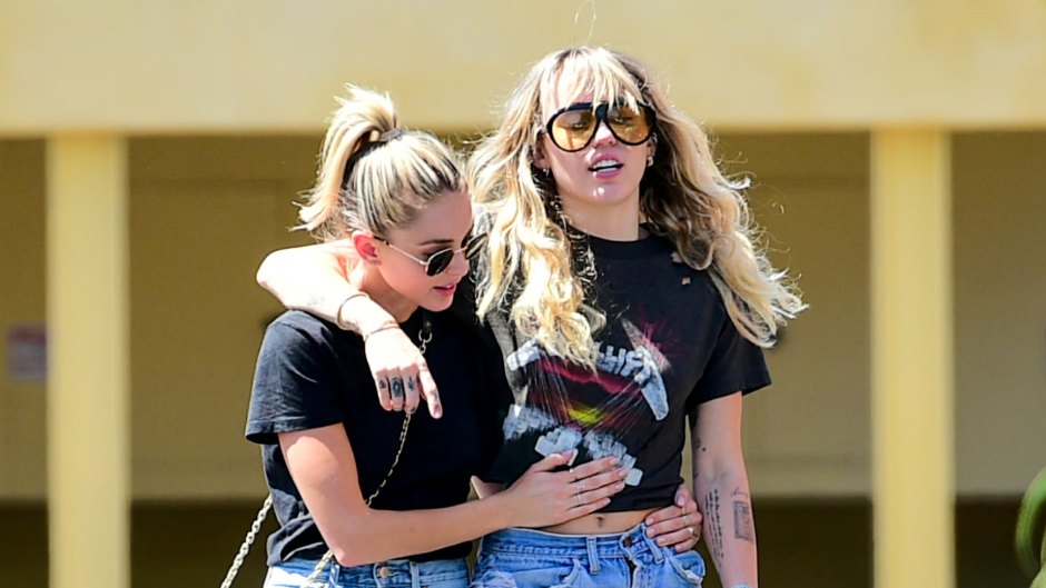 Miley Cyrus Walking With Kaitlynn Carter Wearing Jeans and Black T-Shirts in Los Angeles