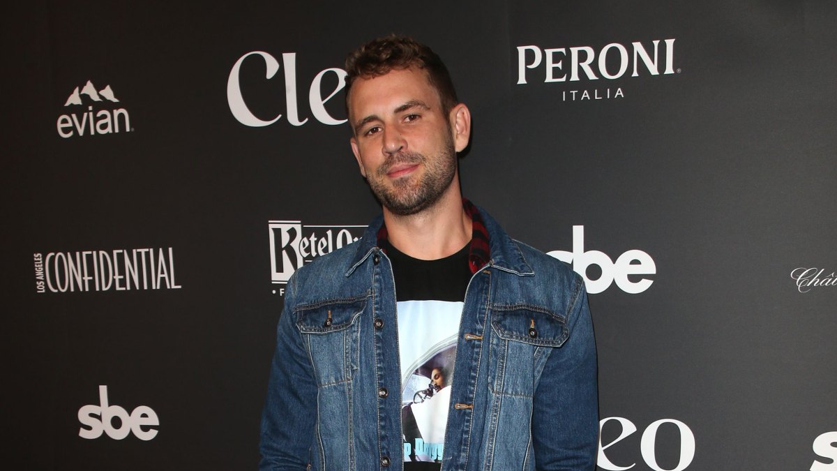 Nick Viall Wearing a Jean Jacket With Black Pants