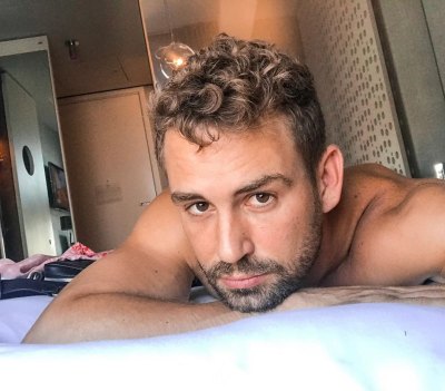 Nick Viall in Bed at a Hotel Taking a Selfie