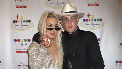 Tana Mongeau and Jake Paul holding hands