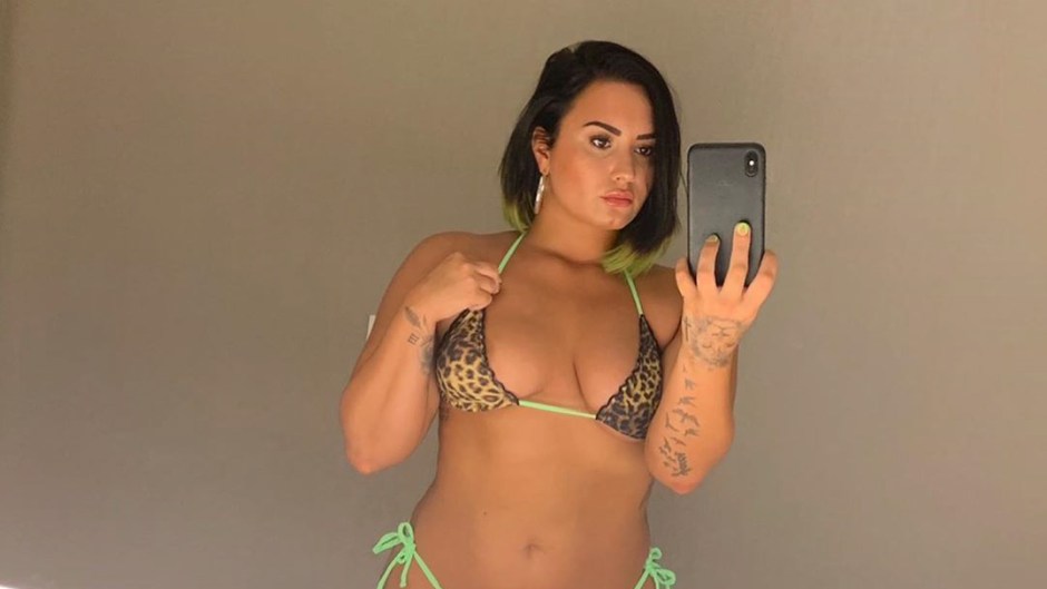 demi lovato wears a neon geen and leopard print string bikini in unedited not photoshopped picture