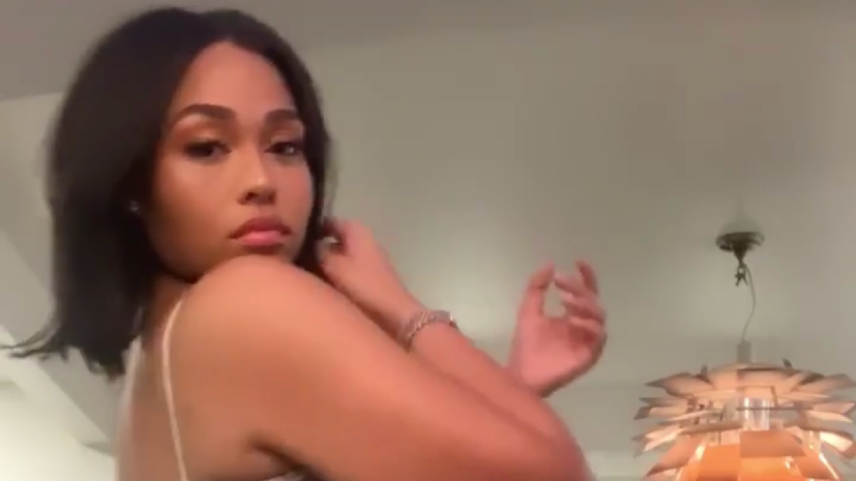 Jordyn Woods in a Snakeskin Dress
