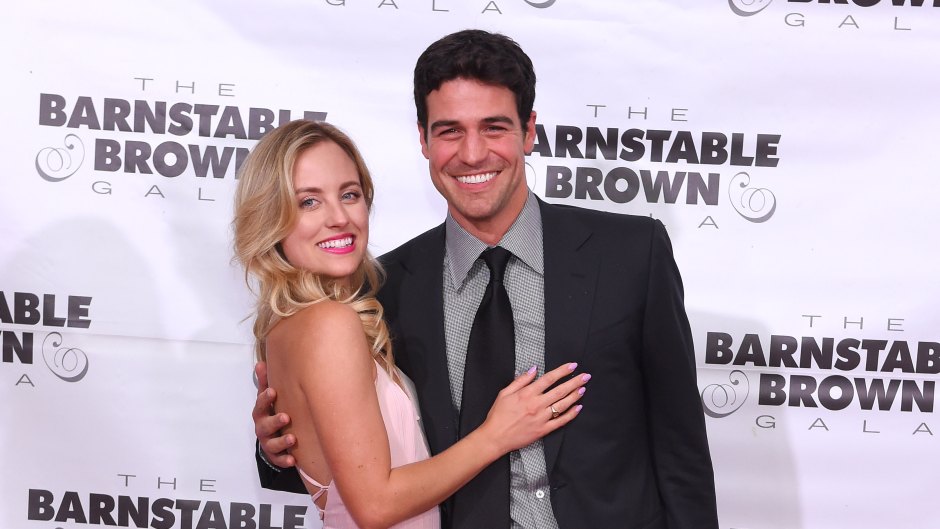 Kendall Long in Long Pink Dress Smiles with Her Arm Around Joe Amabile in a Suit