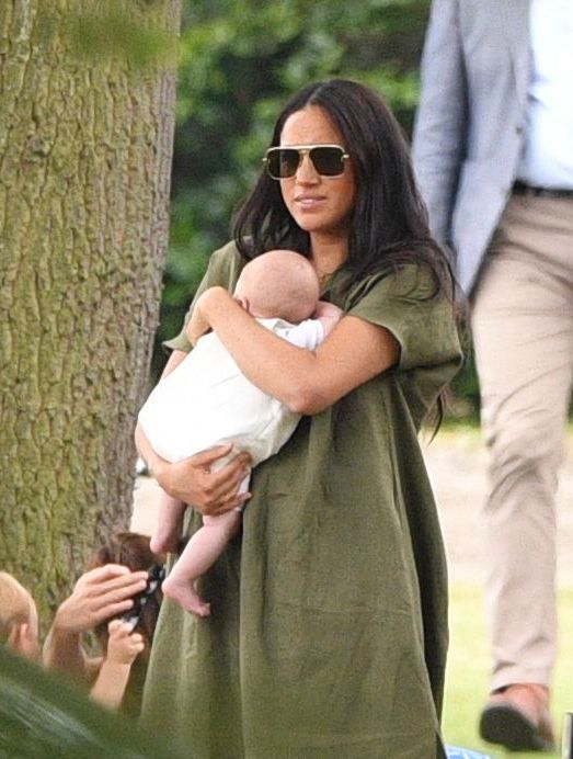 Meghan Markle Cradles Baby Archie in Green Dress