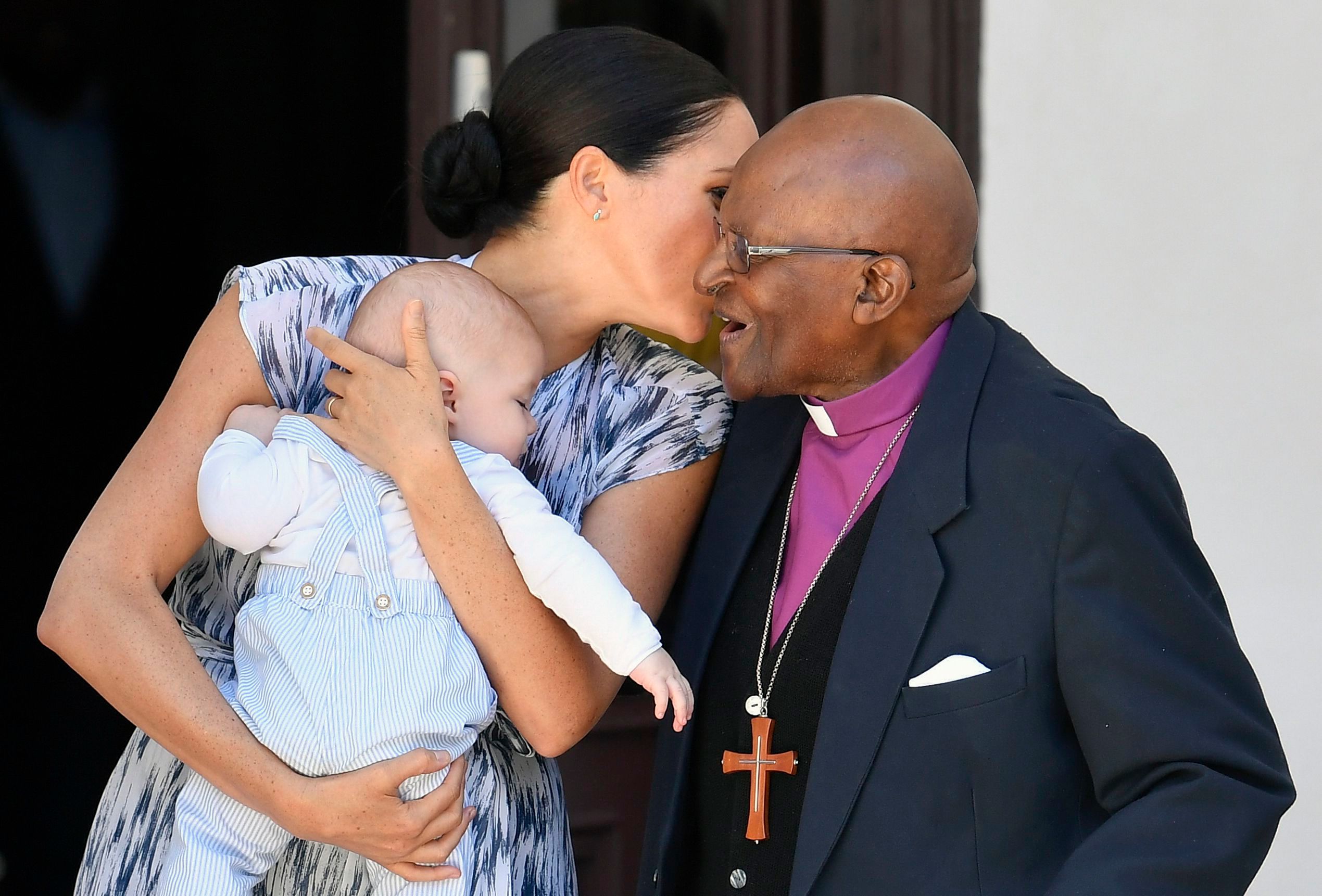 Meghan Duchess of Sussex, holding her son Archie Harrison Mountbatten-Windsor, meets Archbishop Desmond Tutu at the Desmond & Leah Tutu Legacy Foundation in Cape Town, South Africa