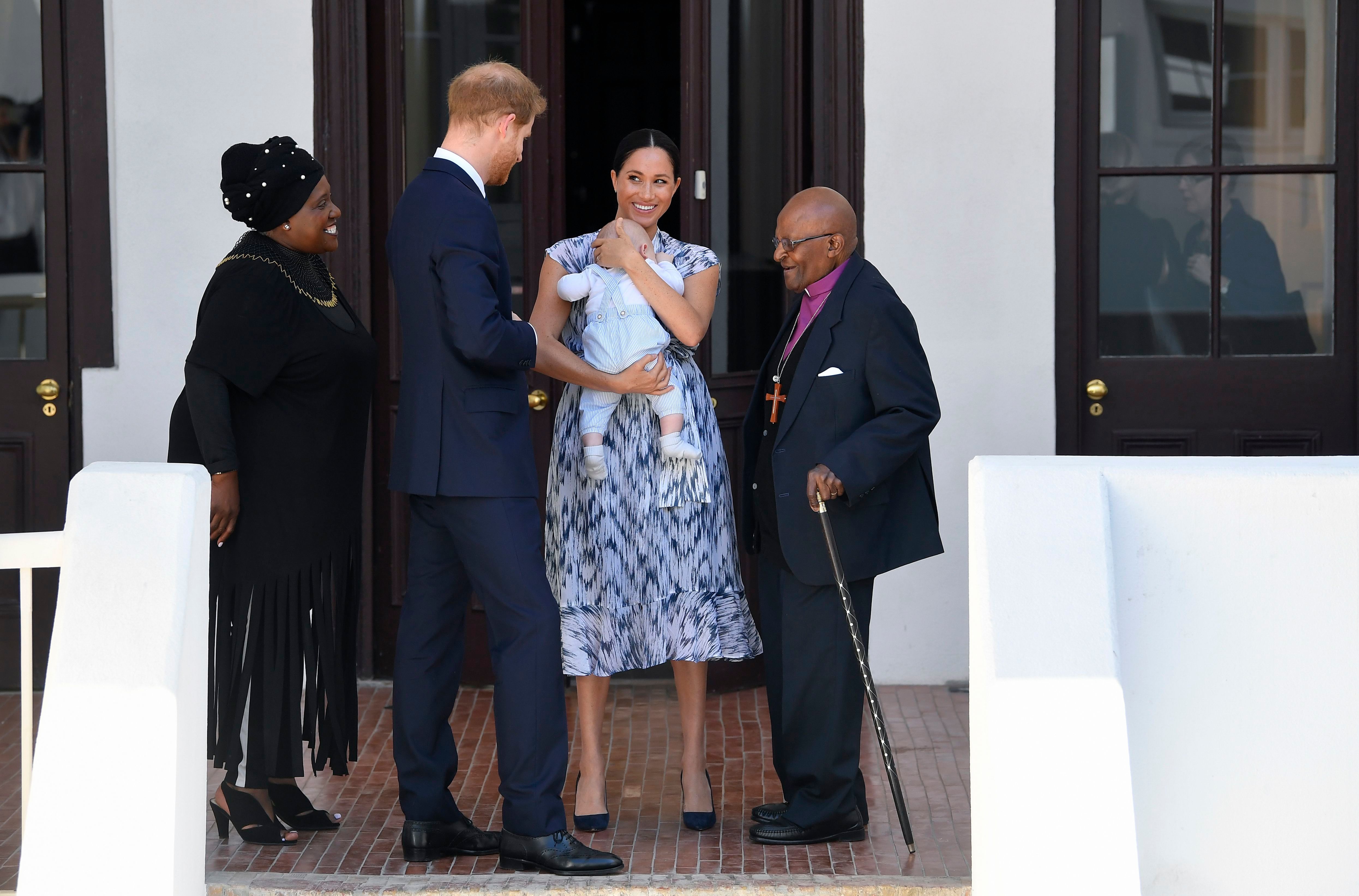 Meghan Markle Holds Archie With Prince Harry and Desmond Tutu