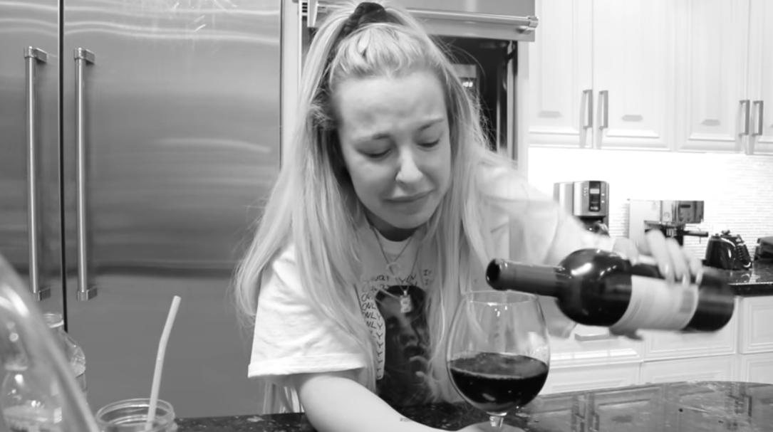 Tana Mongeau Pours Wine