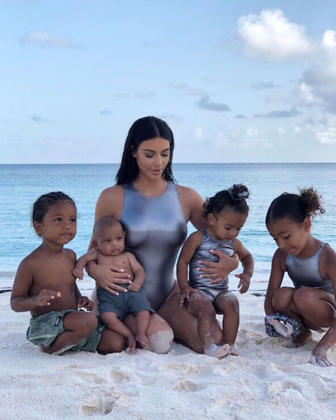 Kim Kardashian Silver Bathing Suit Beach Shares Rare Photo With All of Her Kids