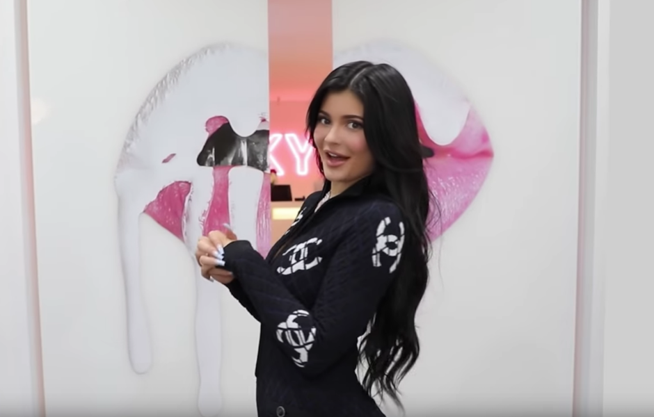 Kylie Jenner Wears a Black Chanel Dress While Showing Off Kylie Cosmetics HQ
