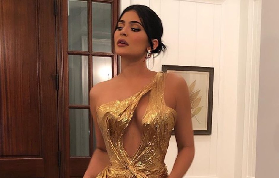 Kylie Jenner in a gold dress at Justin Bieber and Hailey Baldwin's wedding