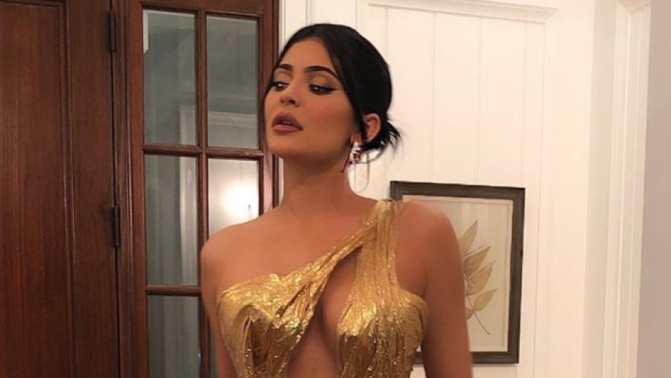 Kylie Jenner in a gold dress at Justin Bieber and Hailey Baldwin's wedding
