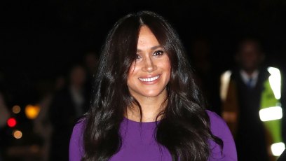 Meghan Markle Duchess of Sussex Steps Out Purple Dress