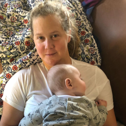 Amy Schumer Snuggling Baby Gene