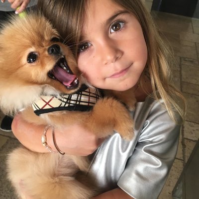 Kourtney Kardashian Shares Photo of Penelope Disick Cuddling Dog