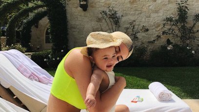 Kylie Jenner Kissing Stormi in Neon Yellow Bikini