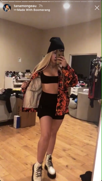 Tana Mongeau Showing Off Her Abs Before Going to an Abandoned Insane Asylum