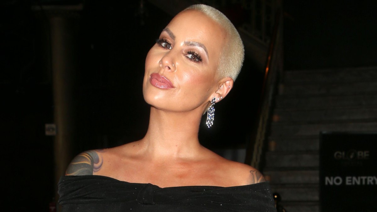 Amber Rose Posing in a Black Dress