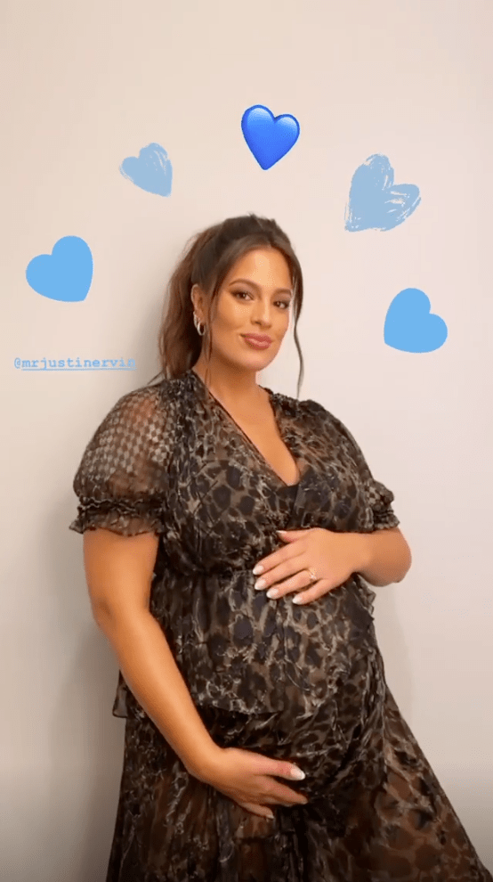 Ashley Graham Holding Her Baby Bump