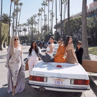 Khloe, Kim, Kylie, Kourtney, Kendall and Kris Jenner Posing on a Car